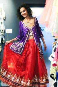 Traditional indian coti styled with a red gota pati lehenga