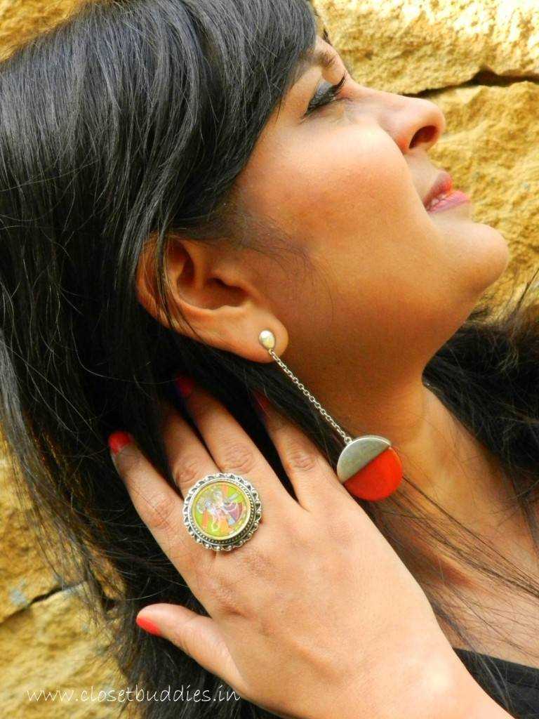 The Silver hand-painted ring is from Amrapali